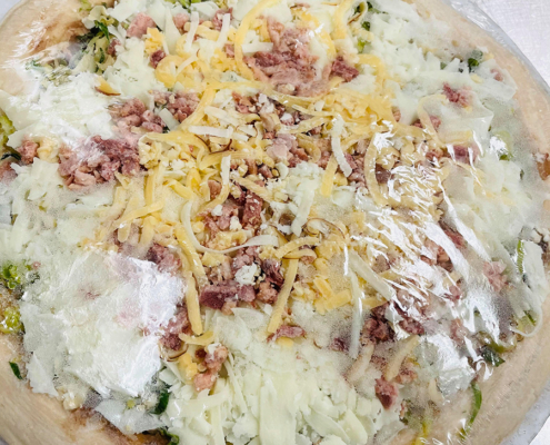 Frozen take-n-bake Brussels and Bacon Pizza - QC Pizza Mahtomedi MN.