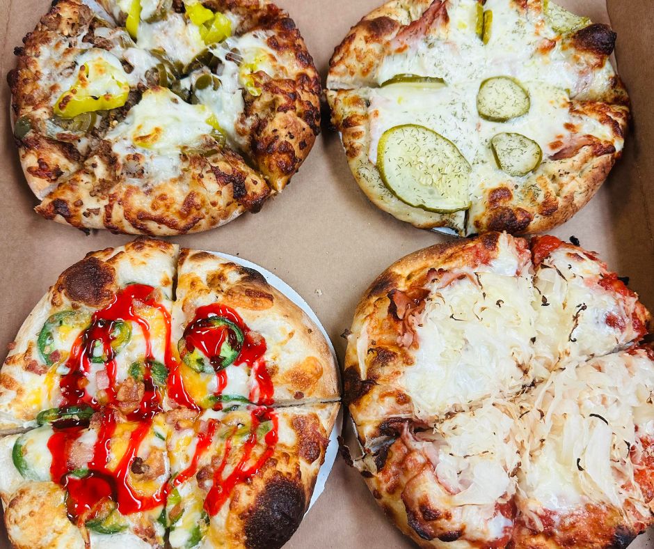 Pizza Flights - four 7-inch pizzas of your choice for $27.