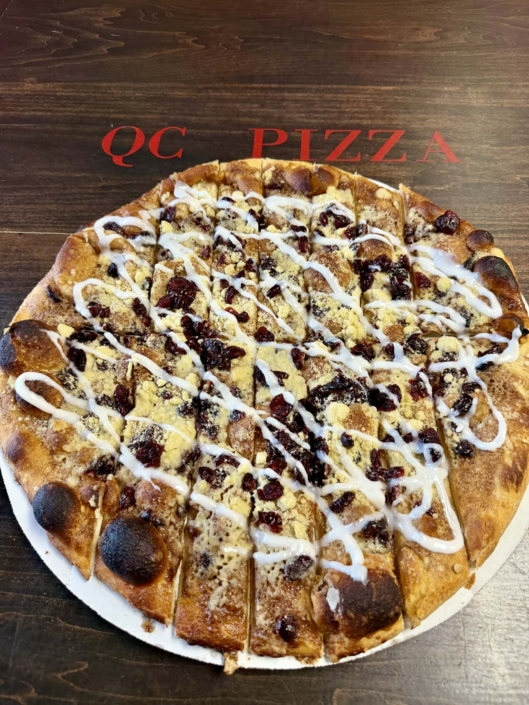 We’re giving you the perfect reason to order a large pizza tonight! For a limited time—while supplies last—receive a FREE medium 12-inch QC Dessert Pizza with the purchase of any large 16-inch pizza. We're giving you the perfect reason to order a large pizza tonight! For a limited time—while supplies last—receive a FREE medium 12-inch QC Dessert Pizza with the purchase of any large 16-inch pizza.